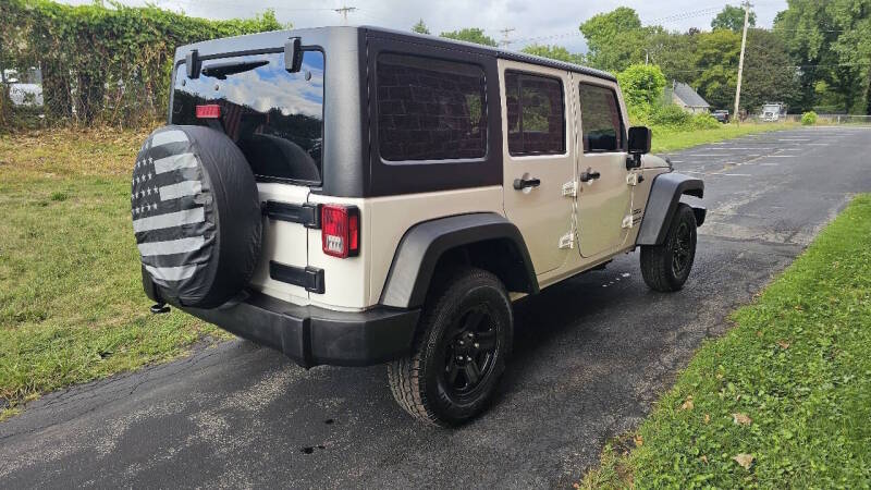 Jeep Wrangler Unlimited for sale at Arcia Services — photo 6