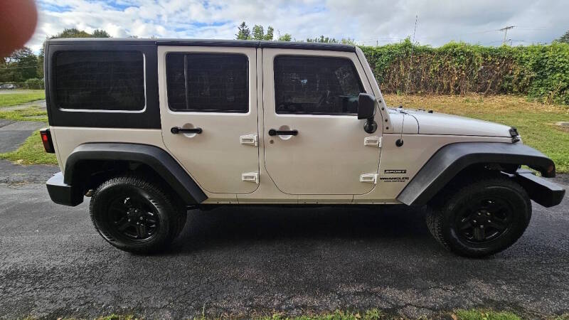 Jeep Wrangler Unlimited for sale at Arcia Services — photo 4