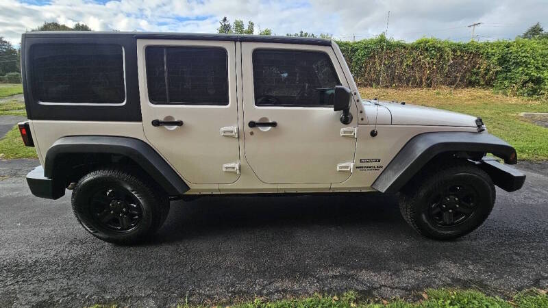 Jeep Wrangler Unlimited for sale at Arcia Services — photo 5