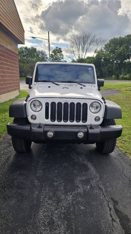 Jeep Wrangler Unlimited for sale at Arcia Services — photo 2