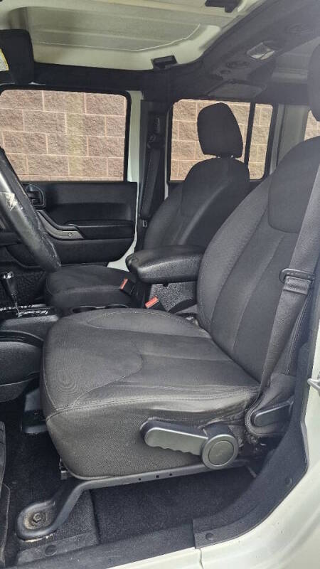 Jeep Wrangler Unlimited for sale at Arcia Services — photo 15