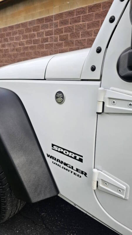 Jeep Wrangler Unlimited for sale at Arcia Services — photo 13