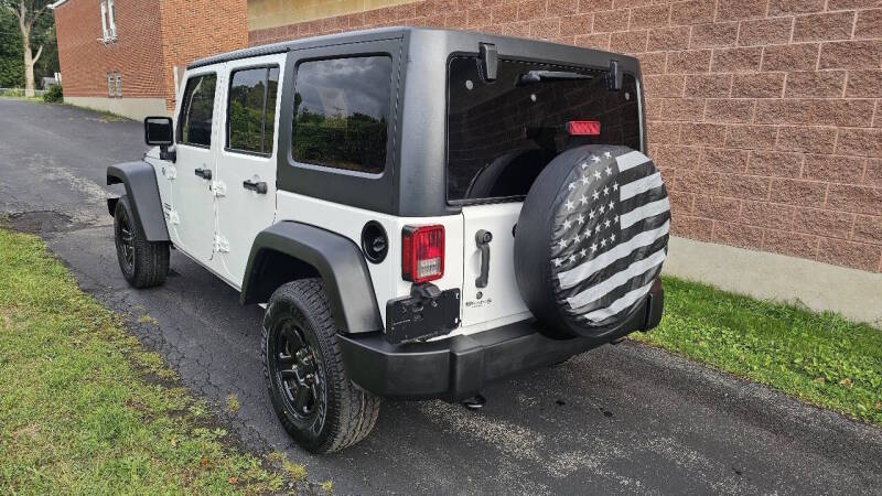 Jeep Wrangler Unlimited for sale at Arcia Services — photo 10