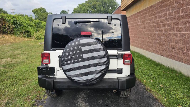 Jeep Wrangler Unlimited for sale at Arcia Services — photo 9