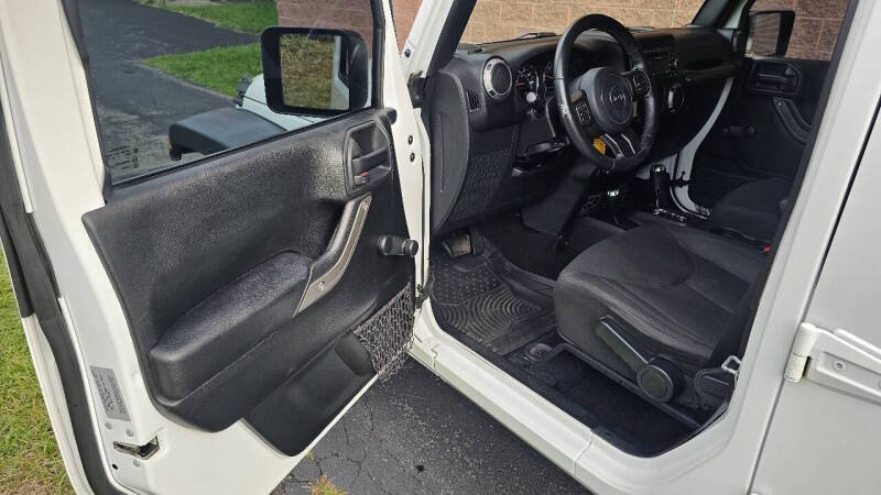 Jeep Wrangler Unlimited for sale at Arcia Services — photo 14