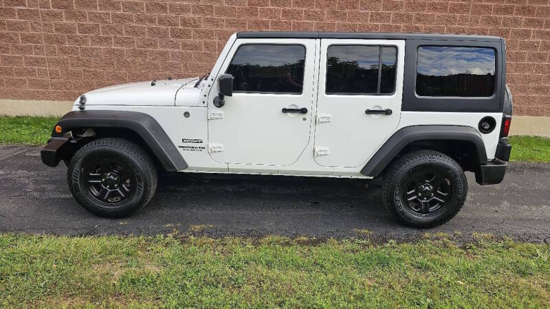 Jeep Wrangler Unlimited for sale at Arcia Services — photo 11