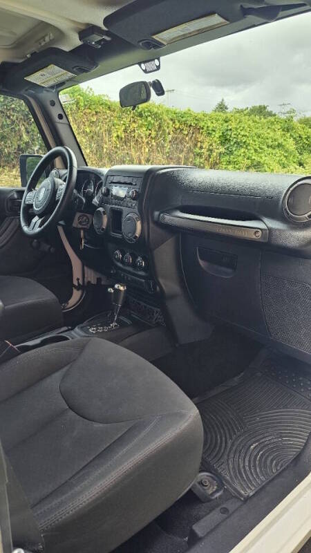 Jeep Wrangler Unlimited for sale at Arcia Services — photo 24