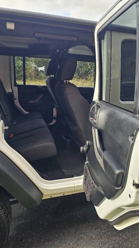 Jeep Wrangler Unlimited for sale at Arcia Services — photo 20