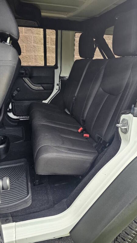 Jeep Wrangler Unlimited for sale at Arcia Services — photo 17