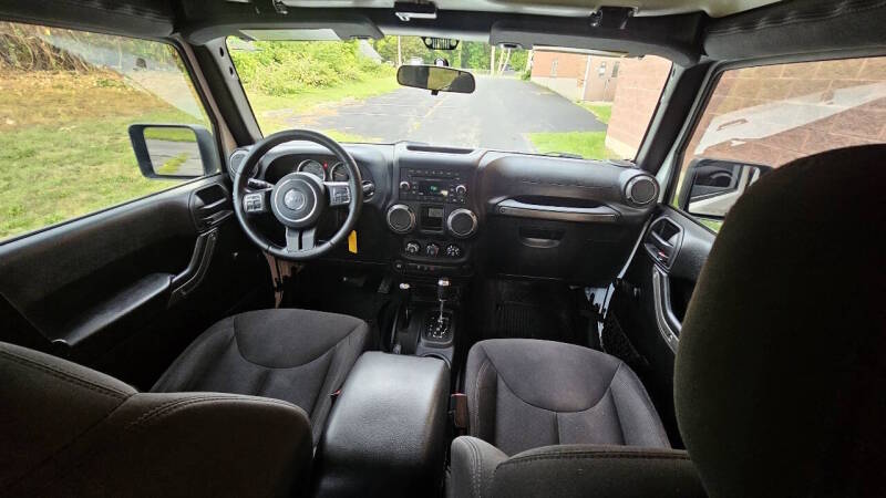 Jeep Wrangler Unlimited for sale at Arcia Services — photo 22