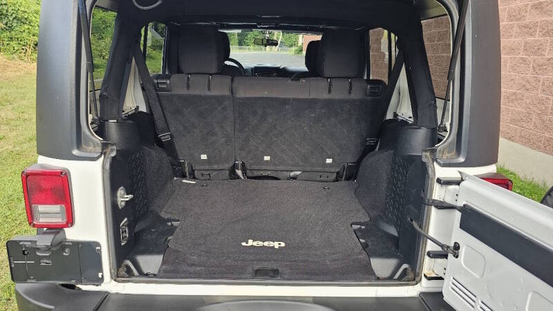 Jeep Wrangler Unlimited for sale at Arcia Services — photo 19