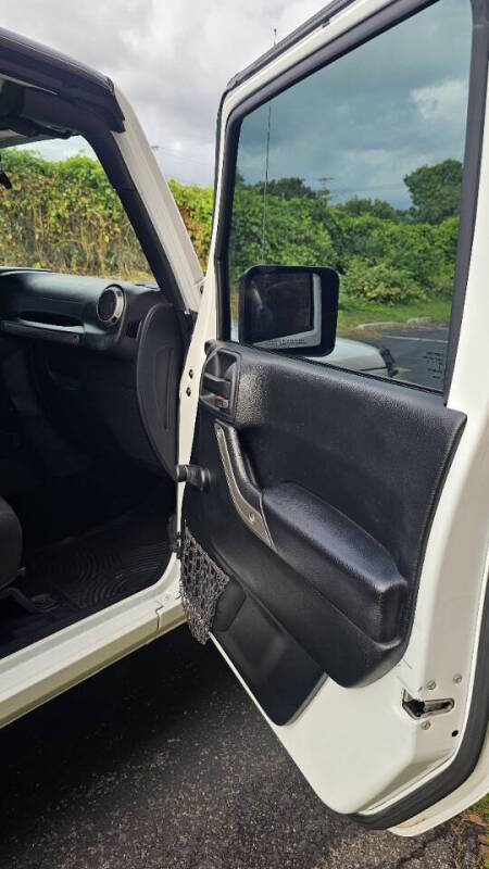 Jeep Wrangler Unlimited for sale at Arcia Services — photo 23