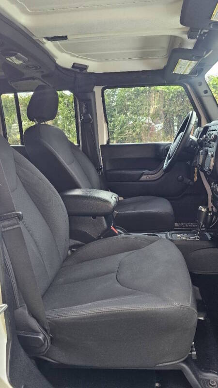 Jeep Wrangler Unlimited for sale at Arcia Services — photo 25