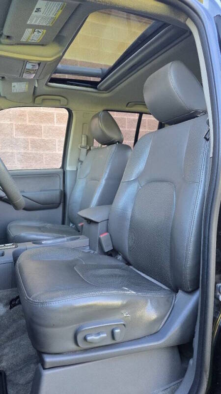 Nissan Frontier for sale at Arcia Services — photo 16