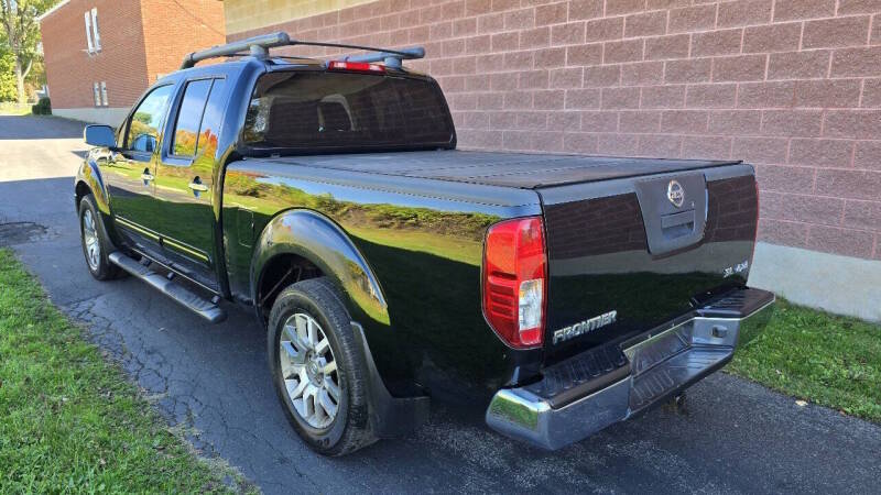 Nissan Frontier for sale at Arcia Services — photo 10