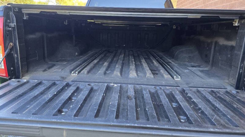 Nissan Frontier for sale at Arcia Services — photo 9
