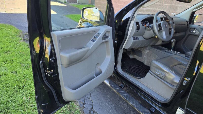 Nissan Frontier for sale at Arcia Services — photo 14