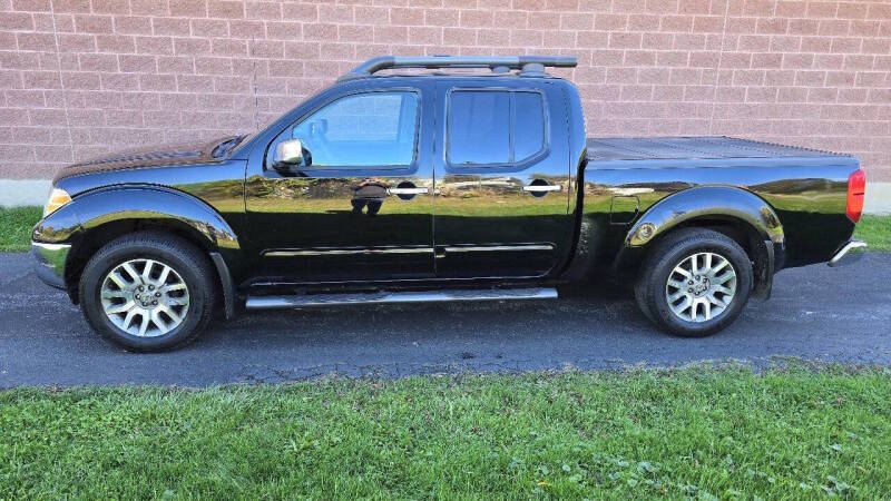 Nissan Frontier for sale at Arcia Services — photo 11