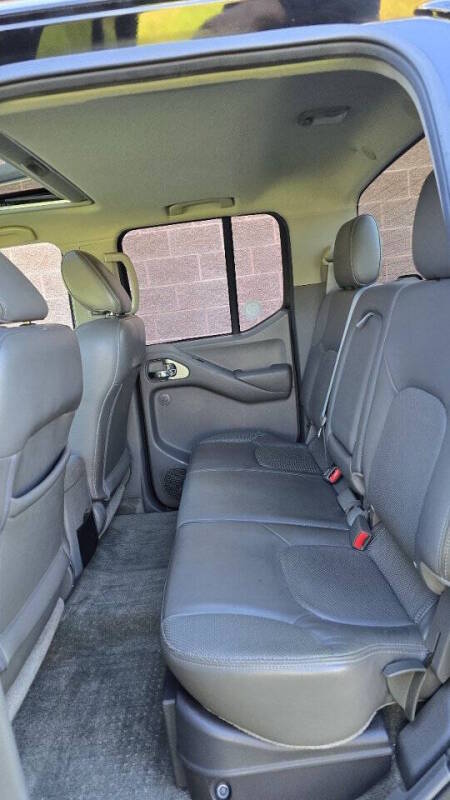 Nissan Frontier for sale at Arcia Services — photo 17
