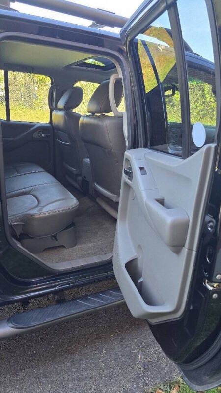 Nissan Frontier for sale at Arcia Services — photo 22