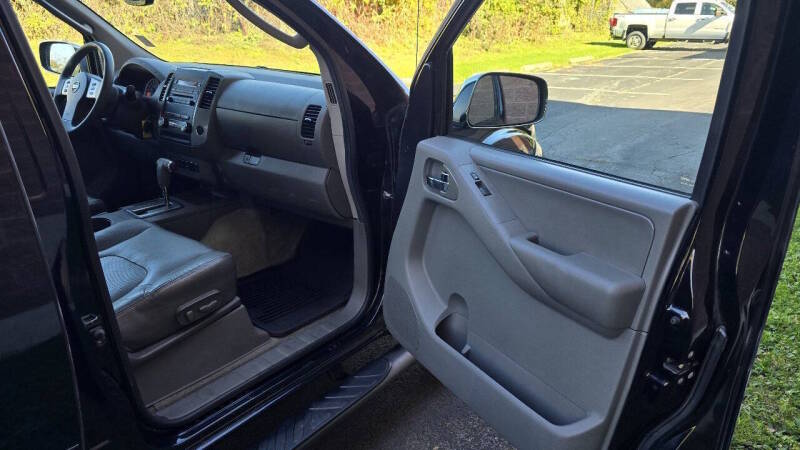 Nissan Frontier for sale at Arcia Services — photo 19