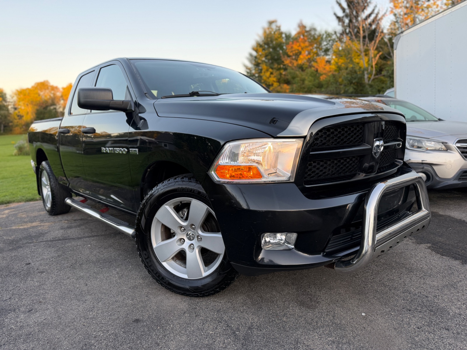2012 Dodge Ram for sale at I90 Auto Group LLC