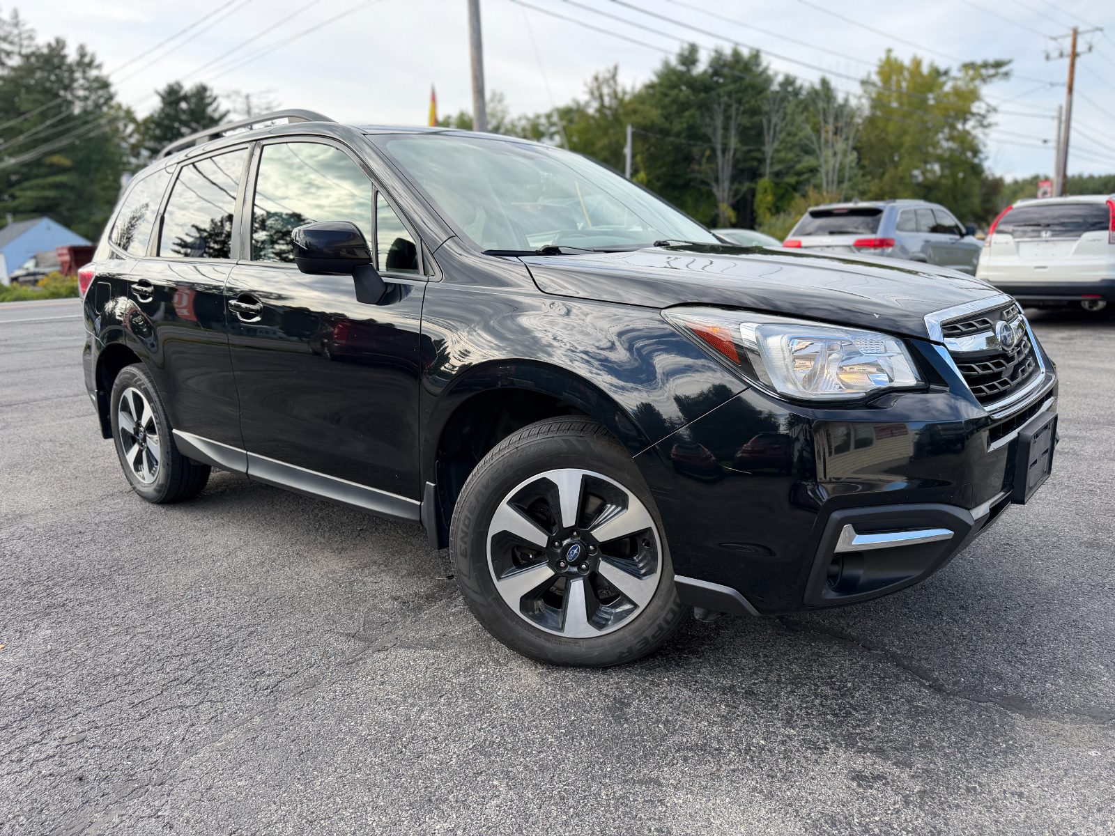 2017 Subaru Forester for sale at I90 Auto Group LLC