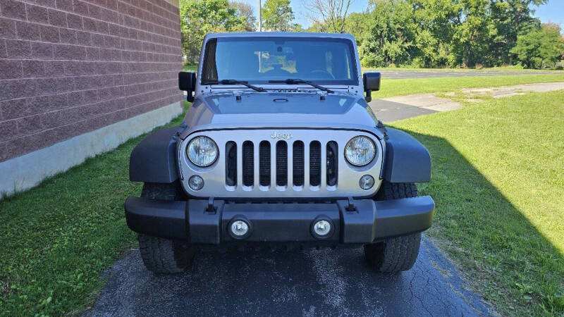 Jeep Wrangler Unlimited for sale at Arcia Services — photo 2