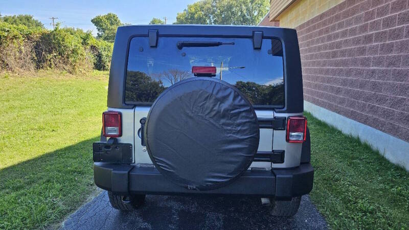 Jeep Wrangler Unlimited for sale at Arcia Services — photo 6