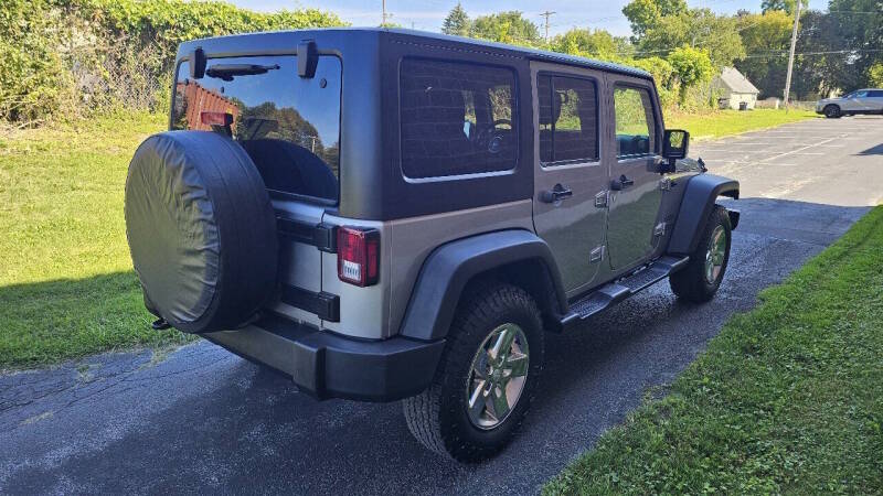 Jeep Wrangler Unlimited for sale at Arcia Services — photo 5