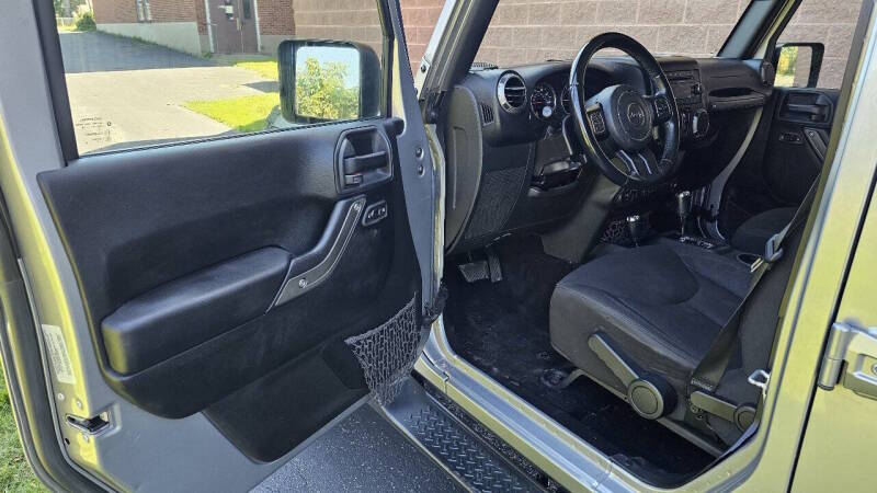 Jeep Wrangler Unlimited for sale at Arcia Services — photo 14
