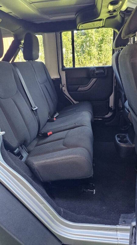 Jeep Wrangler Unlimited for sale at Arcia Services — photo 21