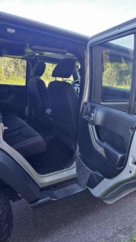 Jeep Wrangler Unlimited for sale at Arcia Services — photo 20