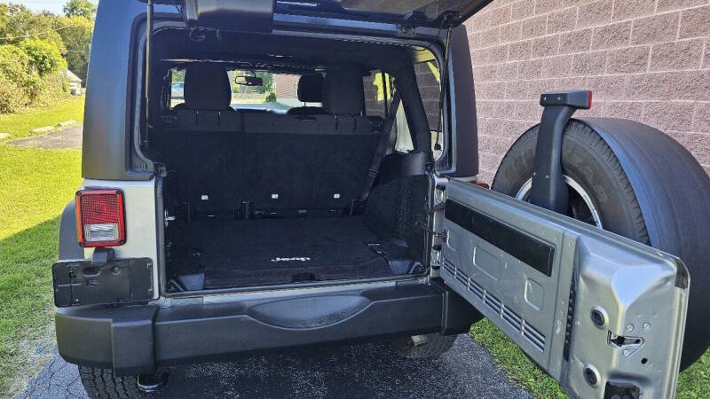 Jeep Wrangler Unlimited for sale at Arcia Services — photo 19
