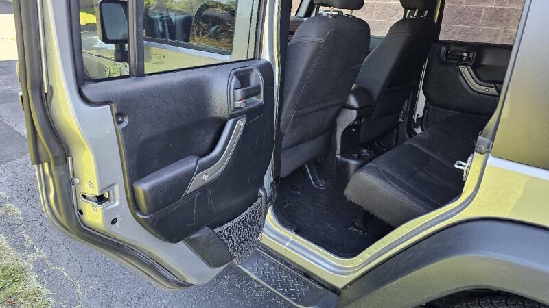 Jeep Wrangler Unlimited for sale at Arcia Services — photo 17