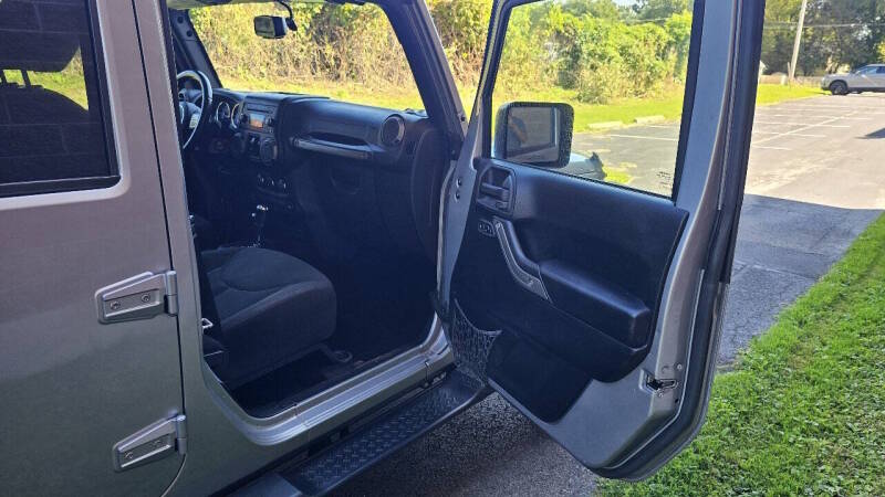 Jeep Wrangler Unlimited for sale at Arcia Services — photo 23