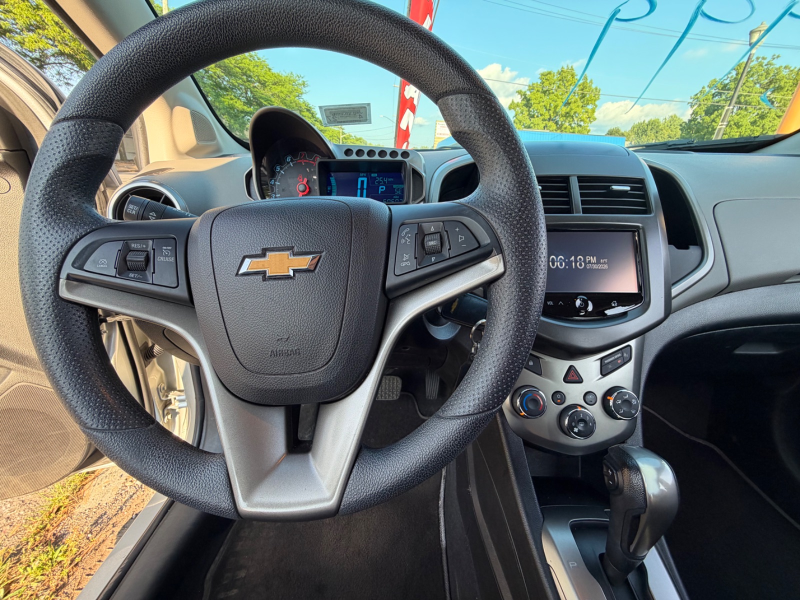 CHEVROLET SONIC for sale at Judes Auto Sales — photo 12