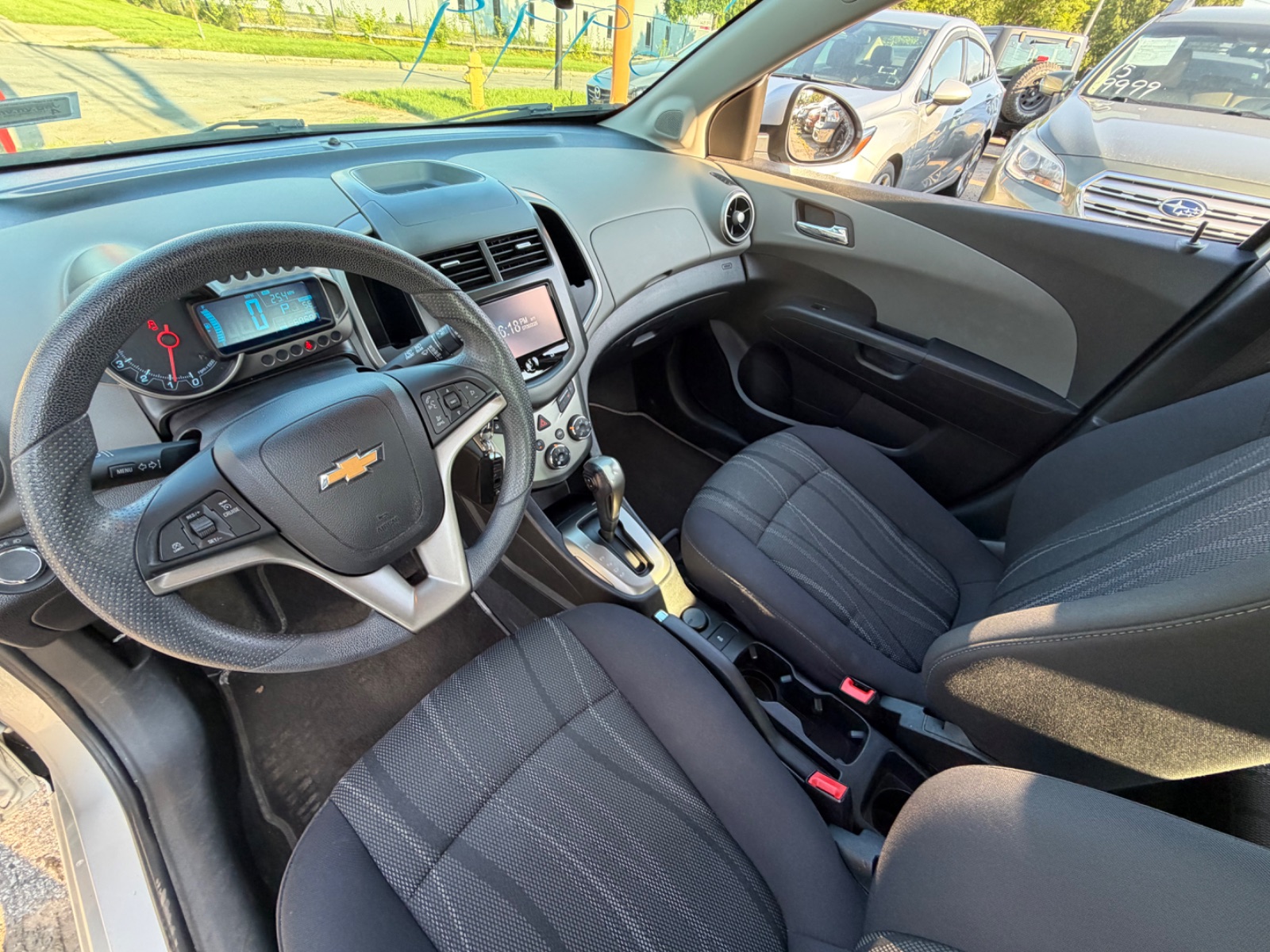 CHEVROLET SONIC for sale at Judes Auto Sales — photo 13