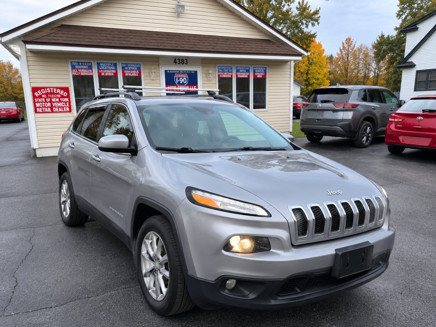 2015 Jeep Cherokee for sale at I90 Auto Group LLC