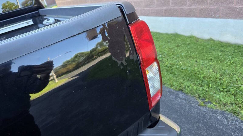 Nissan Frontier for sale at Arcia Services — photo 10