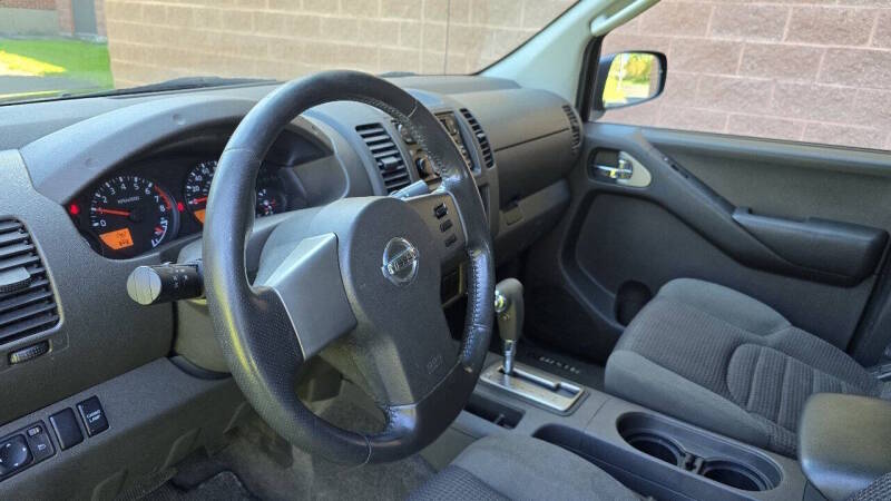 Nissan Frontier for sale at Arcia Services — photo 17