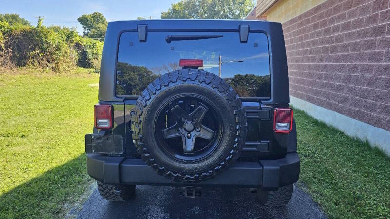 Jeep Wrangler Unlimited for sale at Arcia Services — photo 6