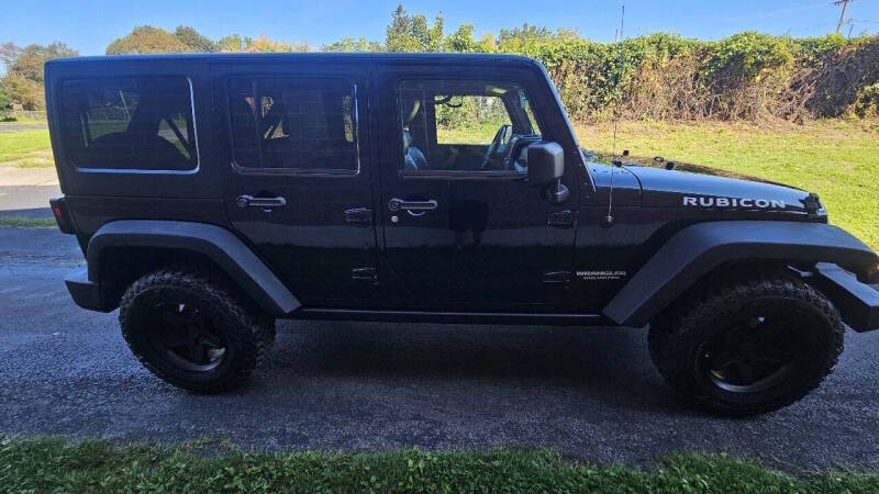 Jeep Wrangler Unlimited for sale at Arcia Services — photo 4