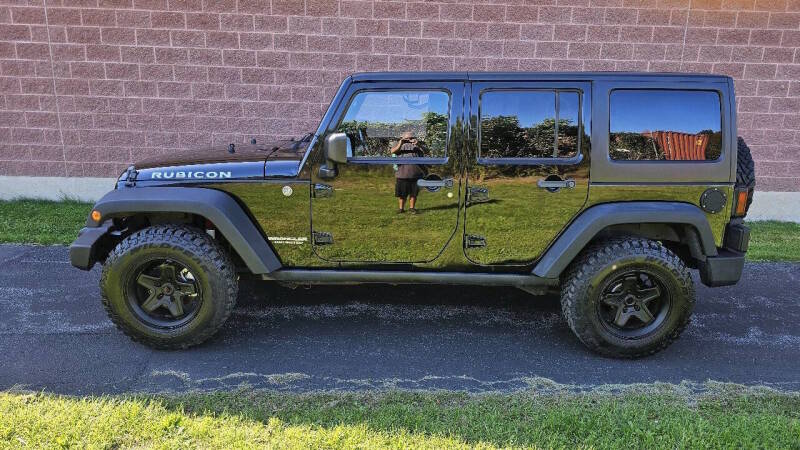 Jeep Wrangler Unlimited for sale at Arcia Services — photo 8