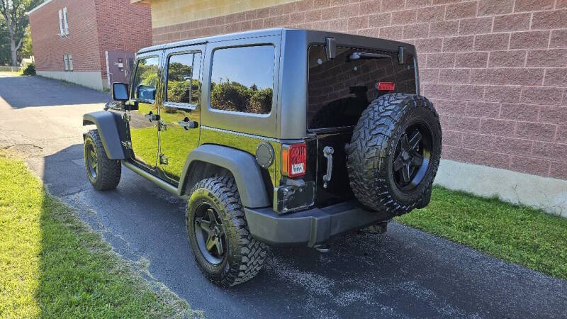 Jeep Wrangler Unlimited for sale at Arcia Services — photo 7