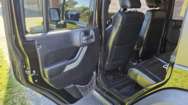 Jeep Wrangler Unlimited for sale at Arcia Services — photo 15