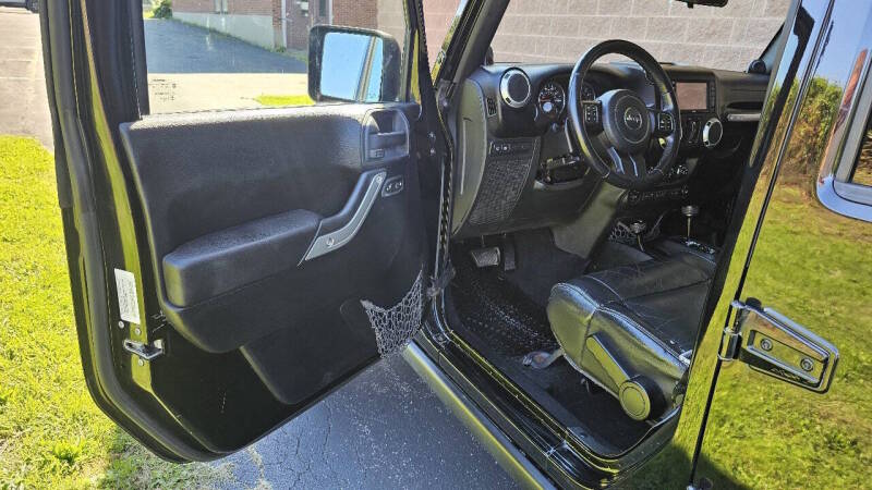 Jeep Wrangler Unlimited for sale at Arcia Services — photo 12