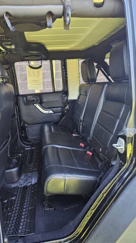 Jeep Wrangler Unlimited for sale at Arcia Services — photo 16