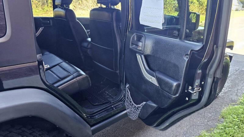 Jeep Wrangler Unlimited for sale at Arcia Services — photo 19
