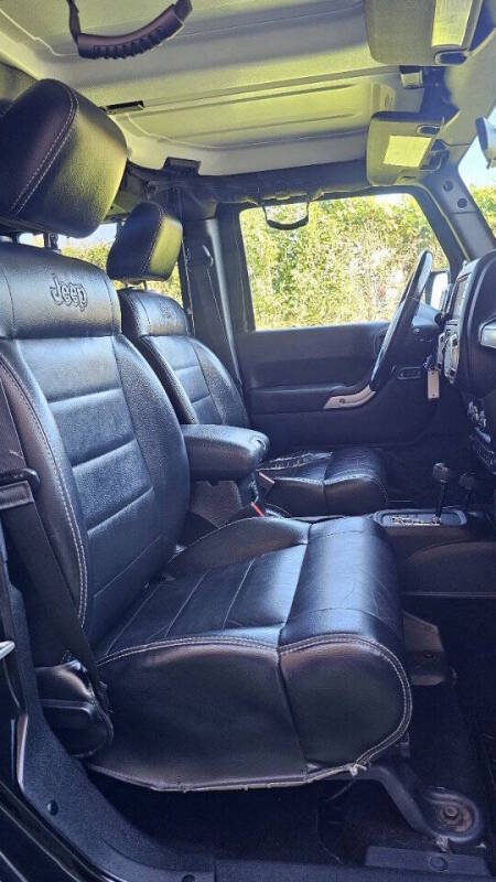 Jeep Wrangler Unlimited for sale at Arcia Services — photo 23